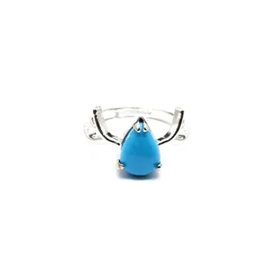 Detailed view of an elegant silver deer antler ring featuring a pear-shaped turquoise stone center