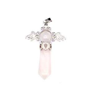 Detailed macro shot of a natural rose quartz hexagonal crystal pendant with silver wings.