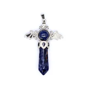 Detailed view of natural blue sodalite crystal pillar pendant with silver wings