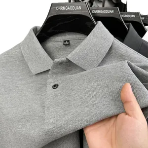 Grey short sleeve 100% cotton polo shirt featuring breathable pique fabric and classic collar