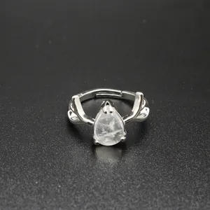 Detailed view of the teardrop natural stone ring featuring a silver deer antler design