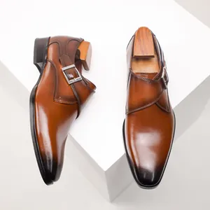 Luxury brown monk strap leather shoes with elegant burnished toe and silver buckle