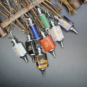 Natural stone dowsing pendulums with golden Om symbol for spiritual healing and meditation