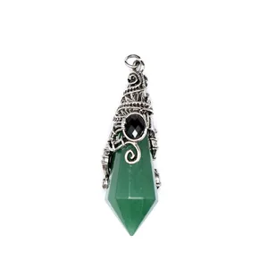 Detailed view of green crystal pendant with vintage silver wire wrap design.