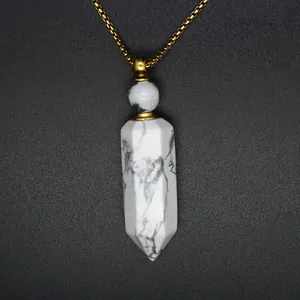 Detailed close-up of a white marble texture hexagonal crystal perfume bottle necklace.