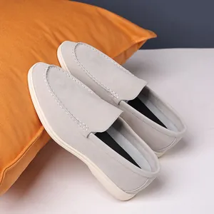 Breathable grey loafers for men featuring lightweight slip-on design and textured finish