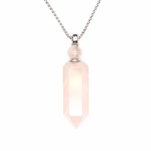 Detailed macro view showing the hexagonal pink crystal perfume bottle pendant necklace