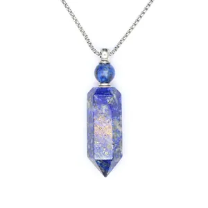 Detailed macro view of a blue hexagonal lapis lazuli crystal aromatherapy bottle necklace
