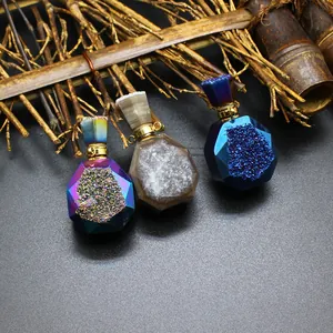 Exquisite detail of three natural druzy agate crystal aromatherapy perfume bottle pendants