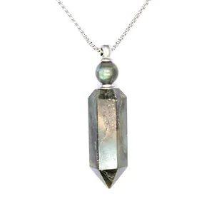 Close-up of a natural stone hexagonal column crystal aroma bottle pendant necklace
