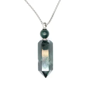 Close-up of a green natural stone hexagonal pillar perfume bottle pendant necklace.