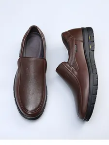 Top-down and side view of premium brown pebbled leather slip-on shoes for men