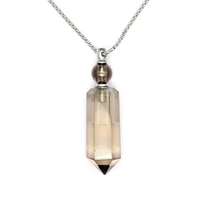 Close-up of hexagonal smoky quartz crystal essential oil bottle necklace pendant