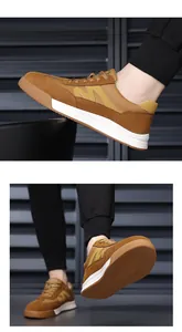 Close-up of brown retro casual sneakers showing side profile and sole texture.