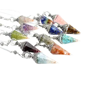 Set of colorful seven chakra crystal resin dowsing pendulums with silver chains