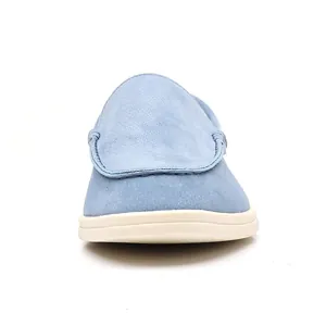 Front view of light blue suede casual loafer with comfortable white sole