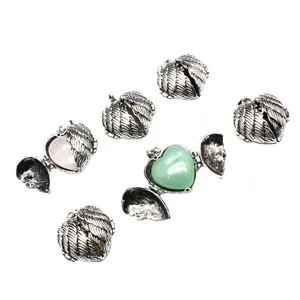 Vintage silver angel wing locket pendants with heart-shaped natural stone inserts