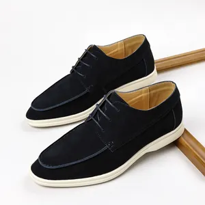 Navy blue suede casual lace-up shoes with a contrast thick white rubber sole
