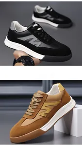 Detailed view of retro men's German trainer sneakers with thick soles