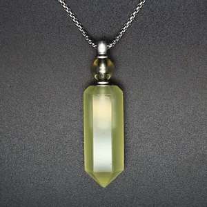 Detailed view of a hexagonal pale yellow translucent crystal perfume bottle pendant necklace