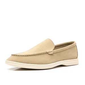 Detailed view of breathable tan suede loafers for men with comfort white sole design
