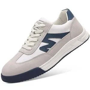 Classic retro men's German trainer sneakers with white leather and grey suede patchwork
