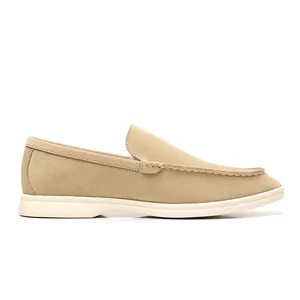 Side profile view of breathable beige suede loafers for men in a casual driving style