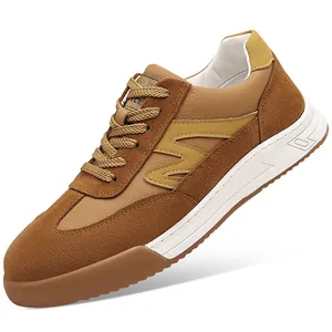 Detailed view of vintage brown suede leather sneakers with thick white rubber midsole