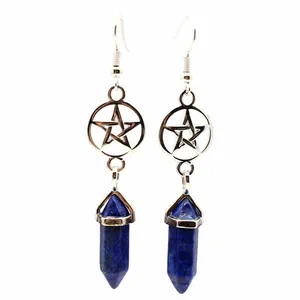Detailed close-up of silver pentagram earrings with blue lapis lazuli stone pendants.