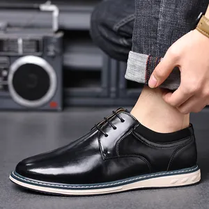 Side view detail of black polished leather men's derby shoes with beige sole