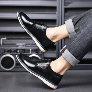 Detailed view of men's black leather dress shoes with thick white soles
