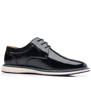 Side view of classic black polished leather men's Derby shoes with beige sole detail