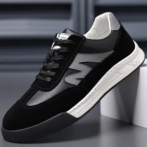 Retro black leather German training sneakers with thick soles for men.