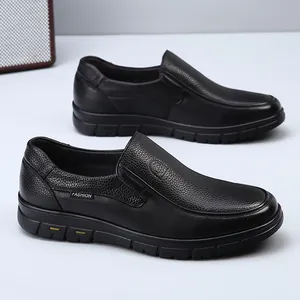 Men's black genuine leather loafers featuring a textured finish and comfortable slip-on design