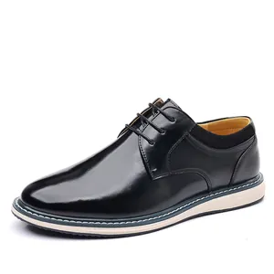 Close-up detail of black men's leather business dress shoes with lace-up design