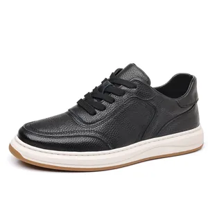 Close-up side view of men's casual black pebble grain leather shoes with white sole