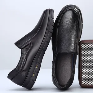 Close-up view of black textured leather loafers for men with a comfortable slip-on design