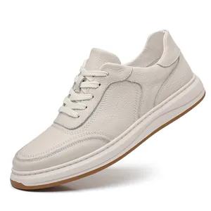 Professional side profile view of premium white men's genuine leather casual sneakers