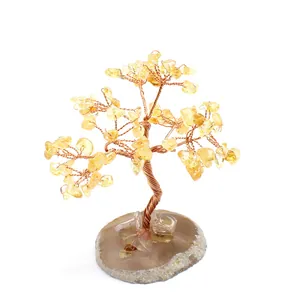 Handmade citrine crystal money tree with copper wire on a natural agate slice base