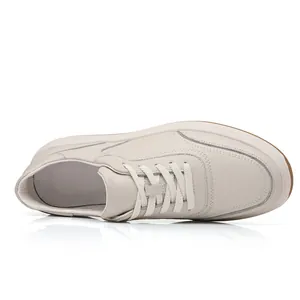 Top view of men's genuine leather casual shoes in beige with textured grain