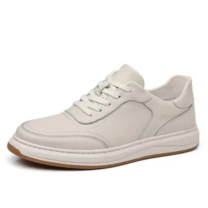 Side view of off-white genuine leather men's casual sneaker with textured finish