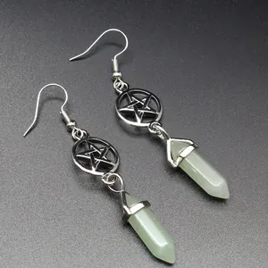 Detailed view of pentagram earrings with light green hexagonal natural stone pendants