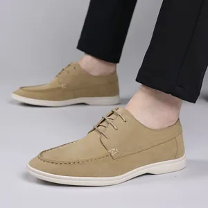 Men's khaki suede casual shoes with laces and white flat sole detail