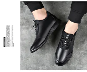 Top-down perspective of black leather sneakers with hidden height-increasing sole for men.
