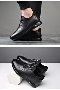 Close-up detail of men's black leather casual shoes with 6cm hidden height lift feature