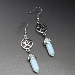 Detailed view of silver pentagram earrings with opalite hexagonal column drops.