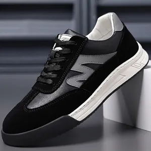 Men's retro black and grey leather sneakers with thick soft sole and round toe design
