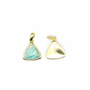 Detailed macro view of a triangular natural Amazonite stone pendant with gold plating