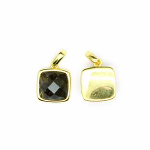 Macro detail view showing front and back of a faceted dark natural stone square pendant