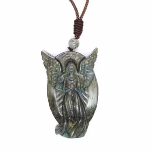 Detailed view of hand-carved natural labradorite angel pendant with blue flash